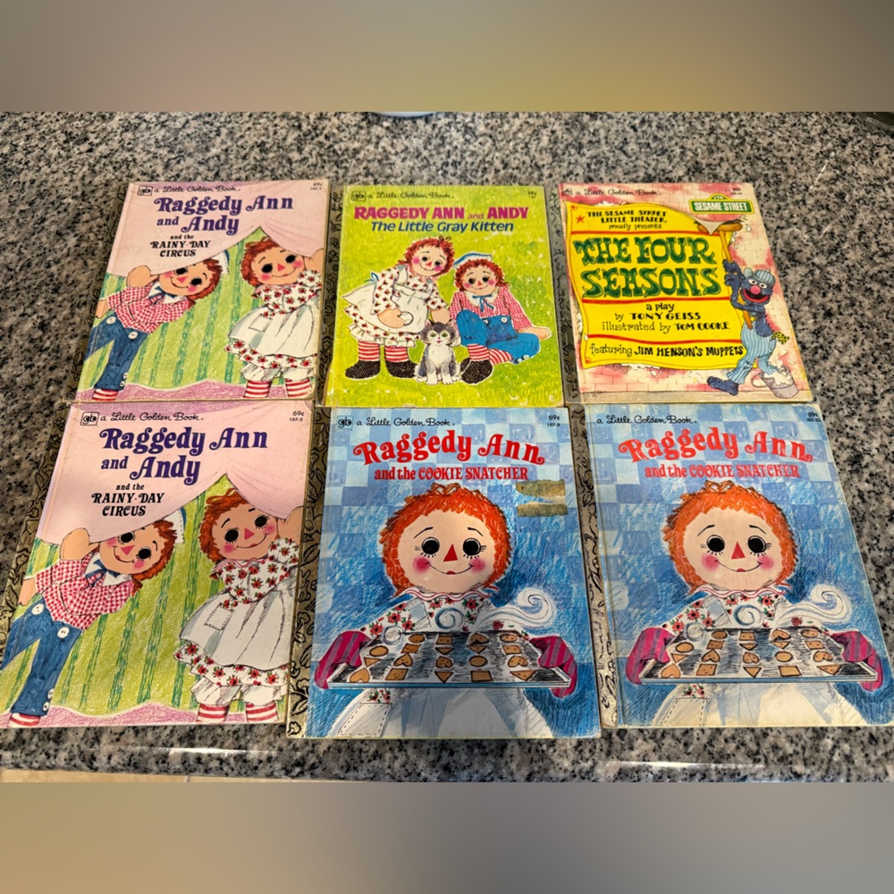 Raggedy Ann duplicates and a sesame street book. Little Golden Book bundle of 5